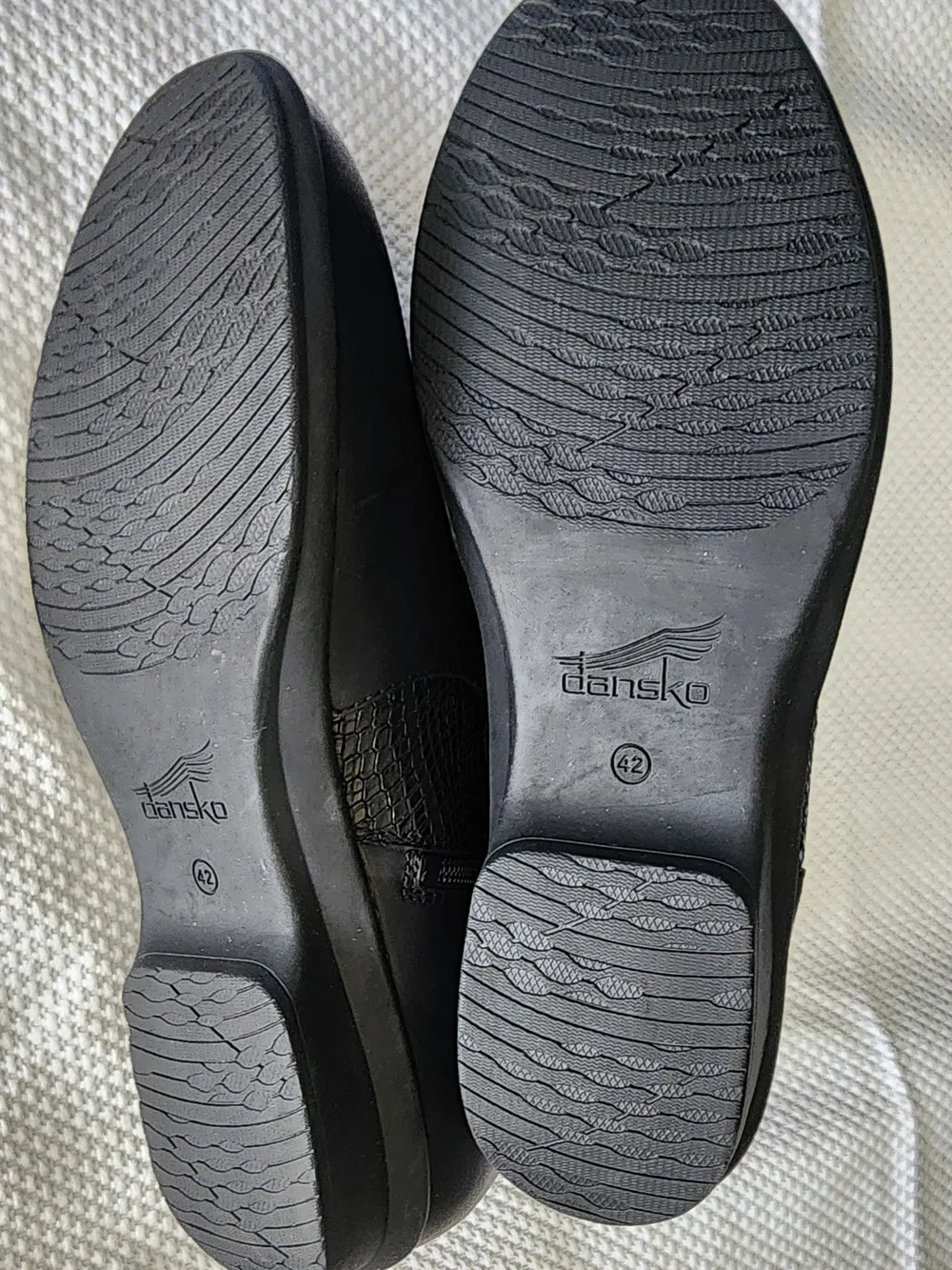 Dansko black leather ankle Boots with side buckle and textured panel